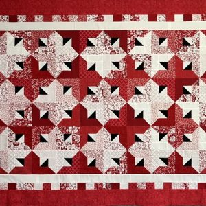 Quilt-a-Whirl quilt made with Jelly Roll fabric strips